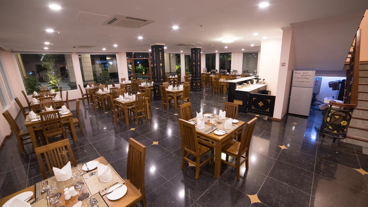 Win Unity Hotel Mandalay Buitenkant foto