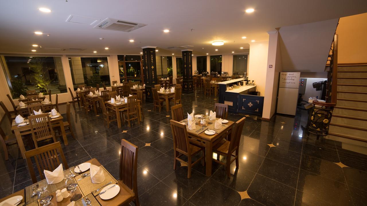 Win Unity Hotel Mandalay Buitenkant foto
