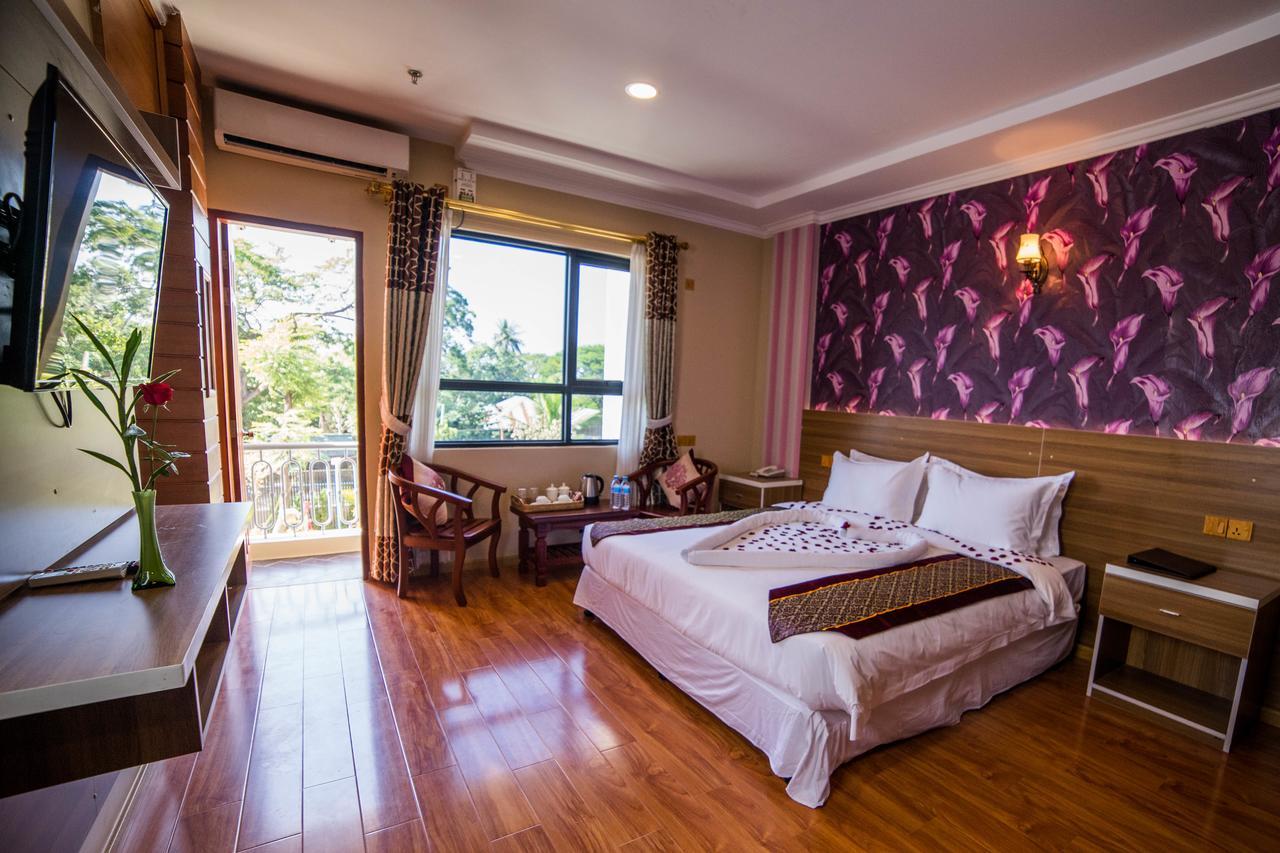Win Unity Hotel Mandalay Buitenkant foto